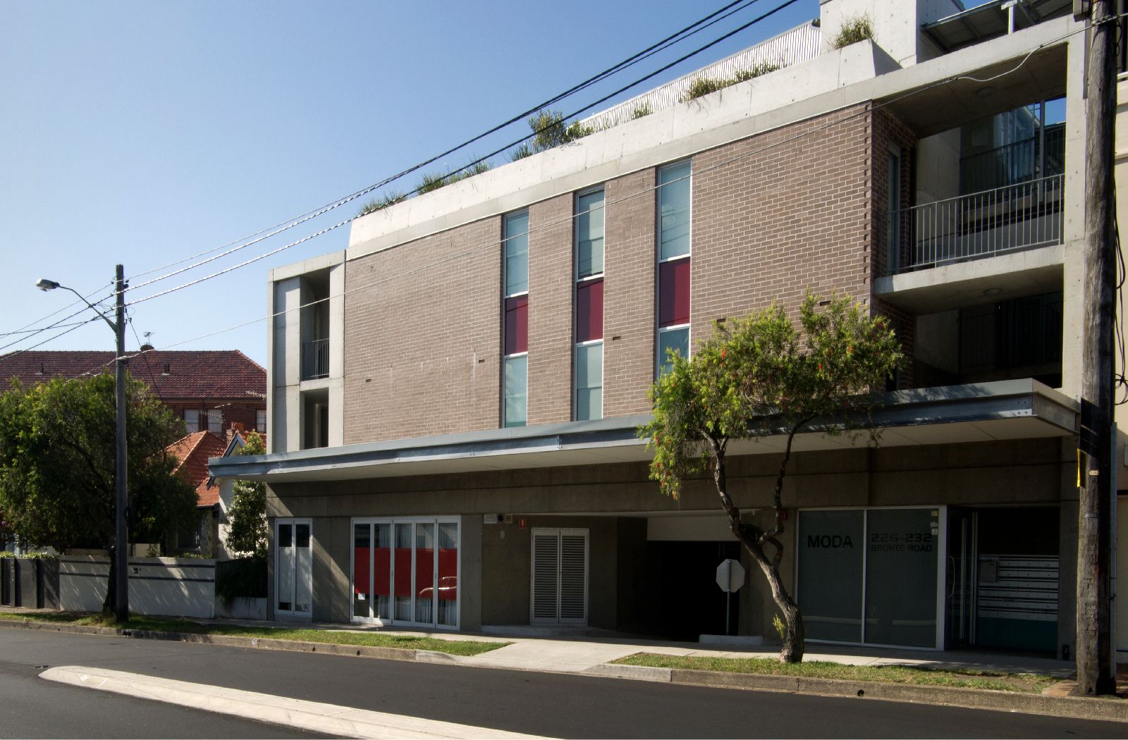 Charing Cross Apartments - Mixed-use apartments with commercial on ground by McGregor Westlake Architecture and Hill Thalis